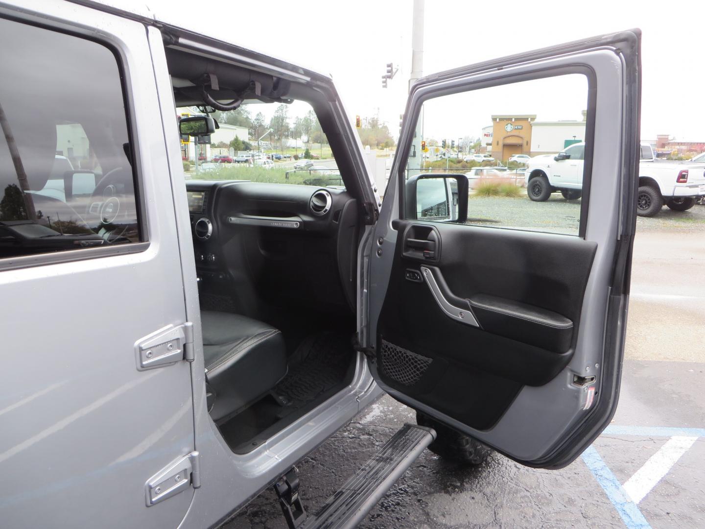 2017 SILVER /BLACK Jeep Wrangler Unlimited Rubicon 4WD (1C4BJWFG3HL) with an 3.6L V6 DOHC 24V FFV engine, automatic transmission, located at 2630 Grass Valley Highway, Auburn, CA, 95603, (530) 508-5100, 38.937893, -121.095482 - Rubicon sitting on a Teraflex suspension system, Falcon shocks, 37" BFG KO2 tires, 17" Hardrock wheels, RC Fender Flares, and AMP steps. - Photo#37